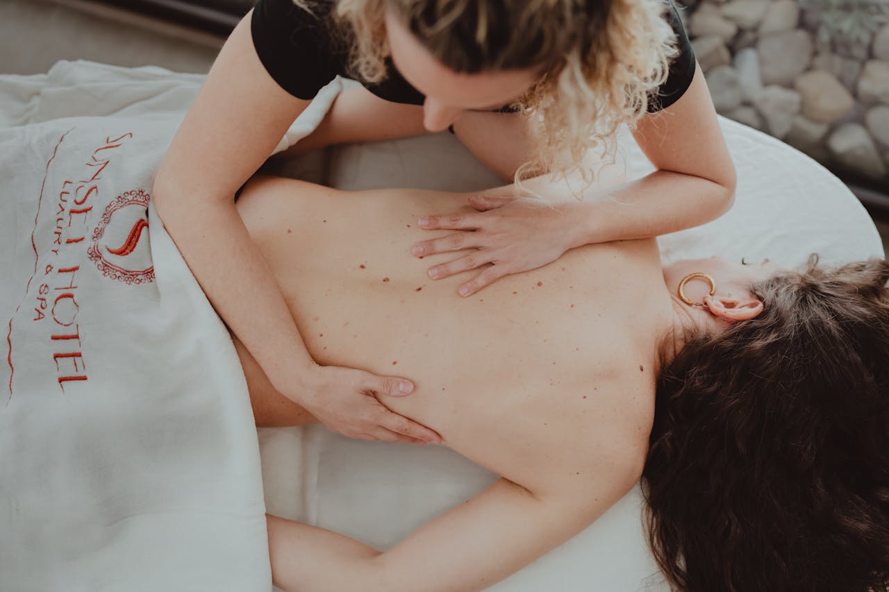 hero-img-01 A soothing massage session at a luxury hotel spa, capturing relaxation and wellness.